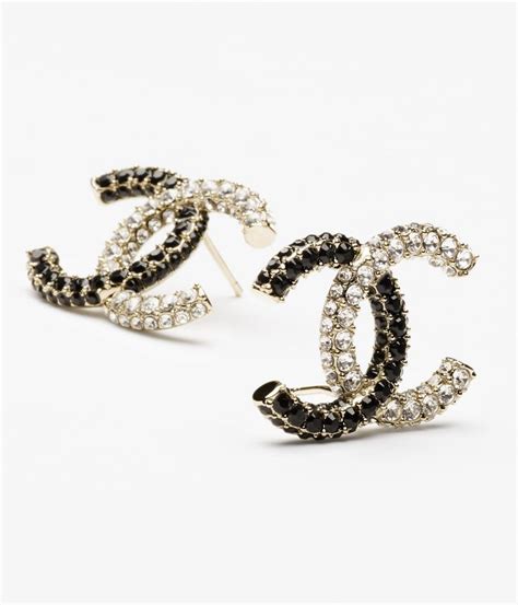 chanel earrings metal and strass gold black crystal|Stud earrings .